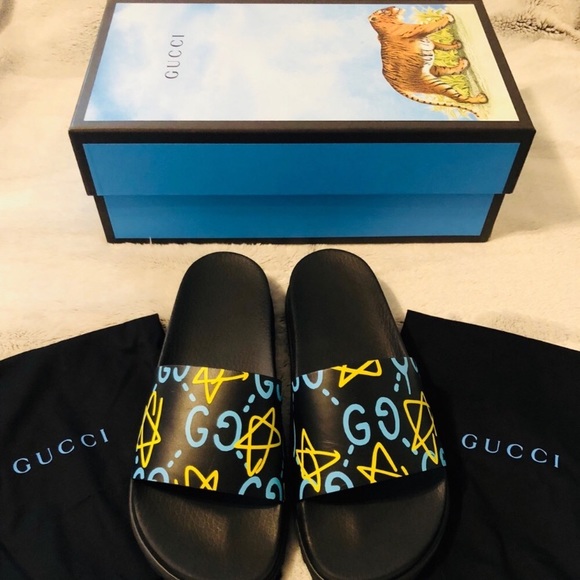 blue and yellow gucci slides